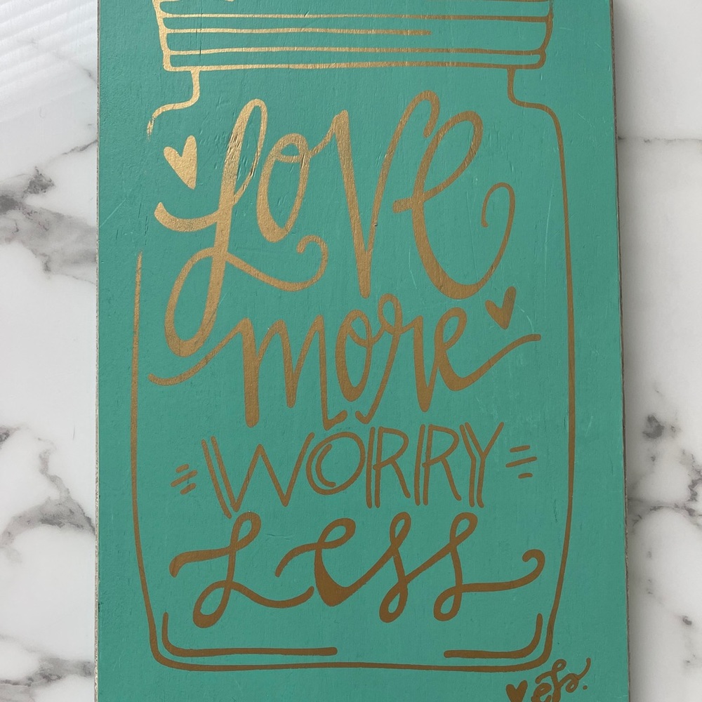 “Love More Worry Less” wooden sign